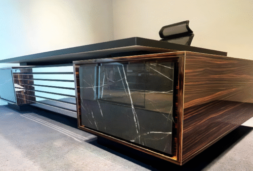 Executive desk made entirely of acrylic, supported by a drawer unit and a side panel, starting from a size of 220 cm.