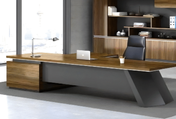 Executive desk with a distinctive design made of MDF wood and PVC veneer, supported by a side panel