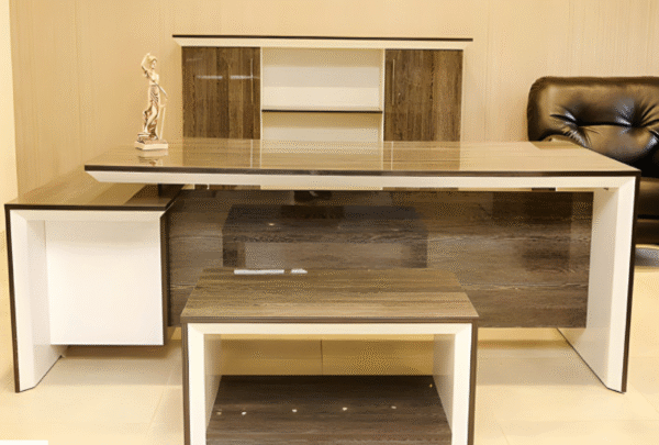 Executive desk with a distinctive design made of MDF wood and PVC veneer, supported by a side panel
