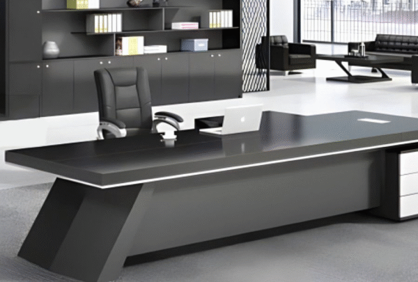 Executive desk with a distinctive design made of MDF wood and PVC veneer, supported by a side panel