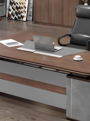 Executive desk with a distinctive design made of MDF wood and PVC veneer, supported by a side panel