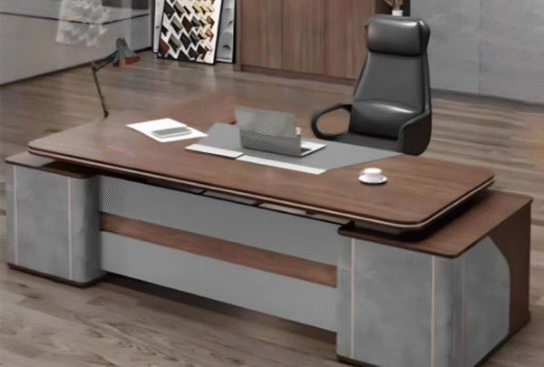 Executive desk with a distinctive design made of MDF wood and PVC veneer, supported by a side panel