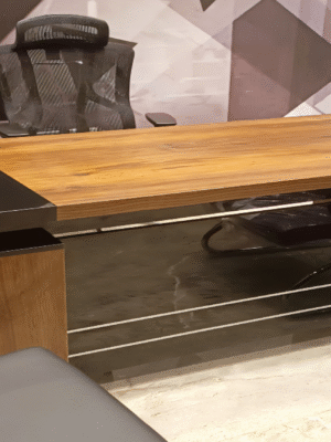 Executive desk with a distinctive design made of MDF wood and PVC veneer, supported by a side panel
