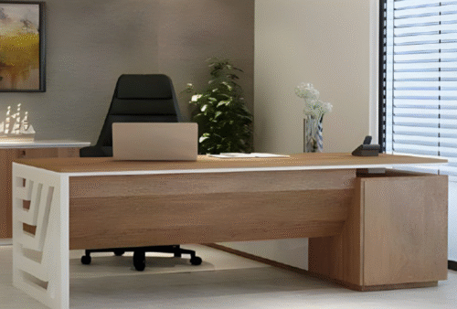 Executive desk with a distinctive design made of MDF wood and PVC veneer, supported by a side panel
