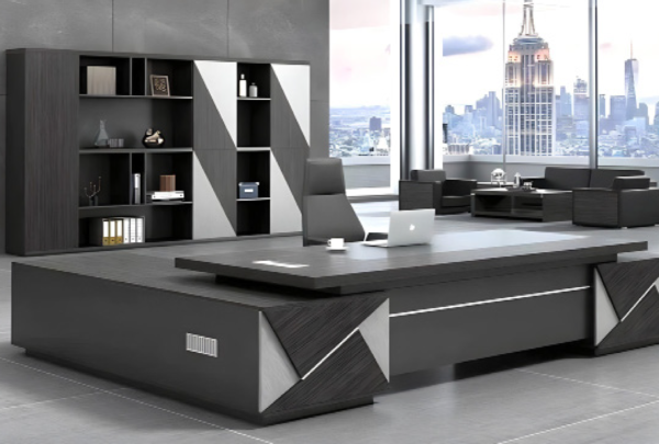 Executive desk with a distinctive design made of MDF wood and PVC veneer, supported by a side panel
