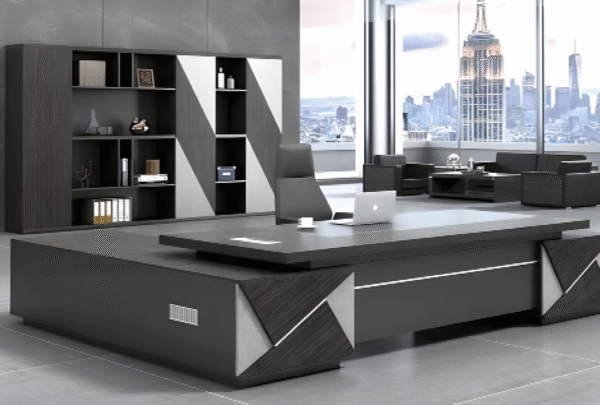 Executive desk with a distinctive design made of MDF wood and PVC veneer, supported by a side panel